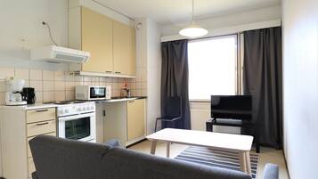 Standard Apartment | Living area | Flat-screen TV