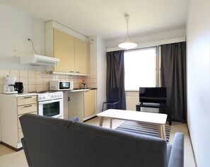 Standard Apartment | Living area | Flat-screen TV