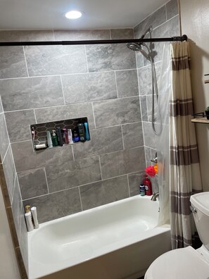 Hair dryer, towels, soap, shampoo