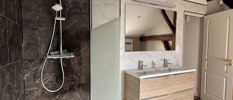 Shower, hair dryer, towels, soap