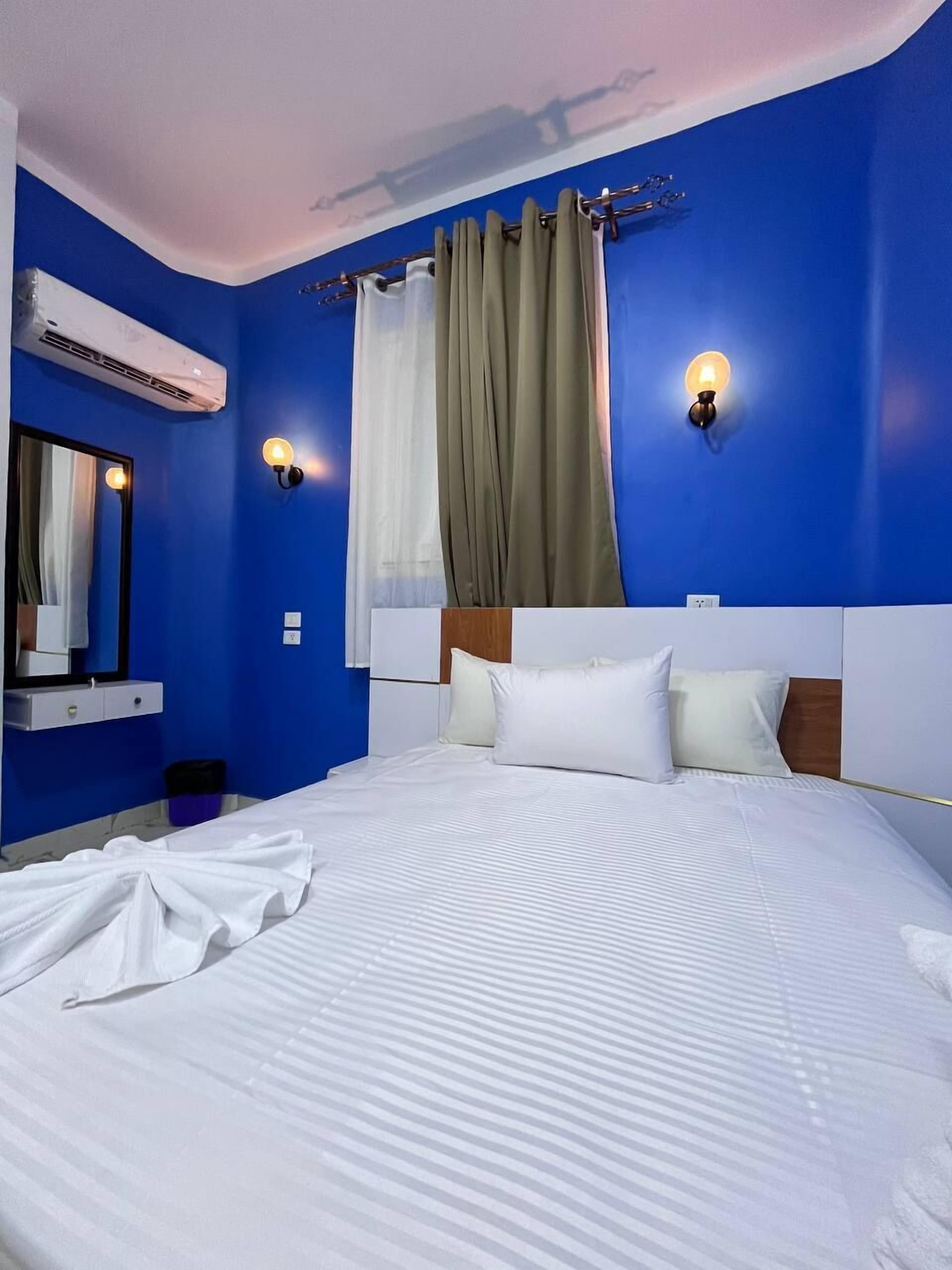 Habitación Deluxe doble, vistas a la ciudad | Caja fuerte y wifi gratis