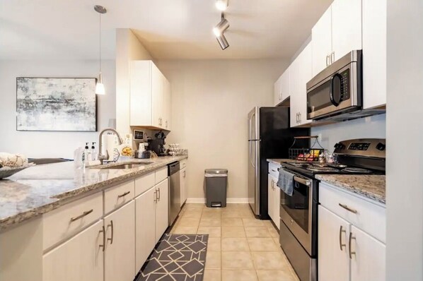 Fridge, microwave, dishwasher, coffee/tea maker