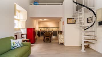 Appartement | Woonruimte | Een 35-inch televisie met digitale zenders