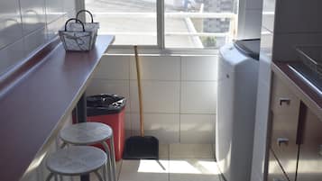 Family Apartment, Multiple Beds, Bathtub, City View | Private kitchen | Full-sized fridge, microwave, oven, stovetop