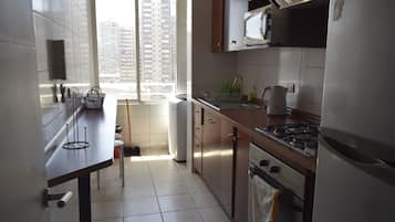 Familienapartment, Mehrere Betten, Badewanne, Stadtblick | Eigene Küche