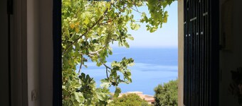 Charming Seaside Retreat with Panoramic Views in Belyounech