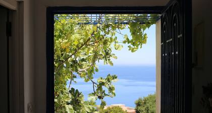 Charming Seaside Retreat with Panoramic Views in Belyounech