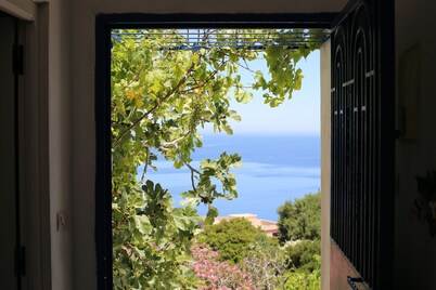 Charming Seaside Retreat with Panoramic Views in Belyounech