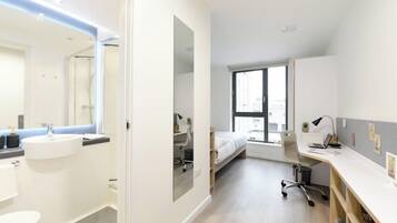 Basic Single Room, Non Smoking | Blackout drapes, free WiFi, bed sheets