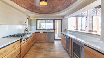 Villa | Private kitchen | Full-size fridge, microwave, oven, stovetop