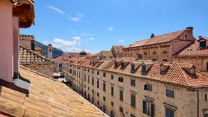 A historic street with traditional architecture, including terracotta-tiled roofs and stone buildings. - 3 TUDISI LUX SUITES by DOMINIUM deluxe double room (loft) (Dubrovnik)