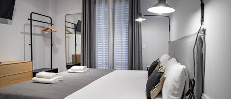 2 habitaciones, tabla de planchar con plancha y wifi gratis