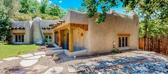 Beautiful adobe home steps the plaza with private patio and garden