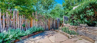 Beautiful adobe home steps the plaza with private patio and garden