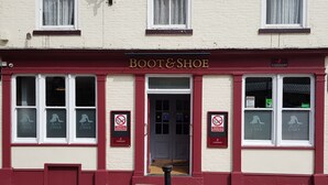 A storefront with a sign reading "Boot & Shoe" and a no-smoking sign. - The Boot & Shoe (Darlington)