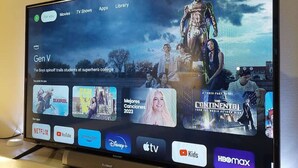 A flat-screen TV mounted on a wall displaying a streaming service interface with various content categories and logos. - Perfect sunny Studio in the city- Broadway- Chippendale (Chippendale)
