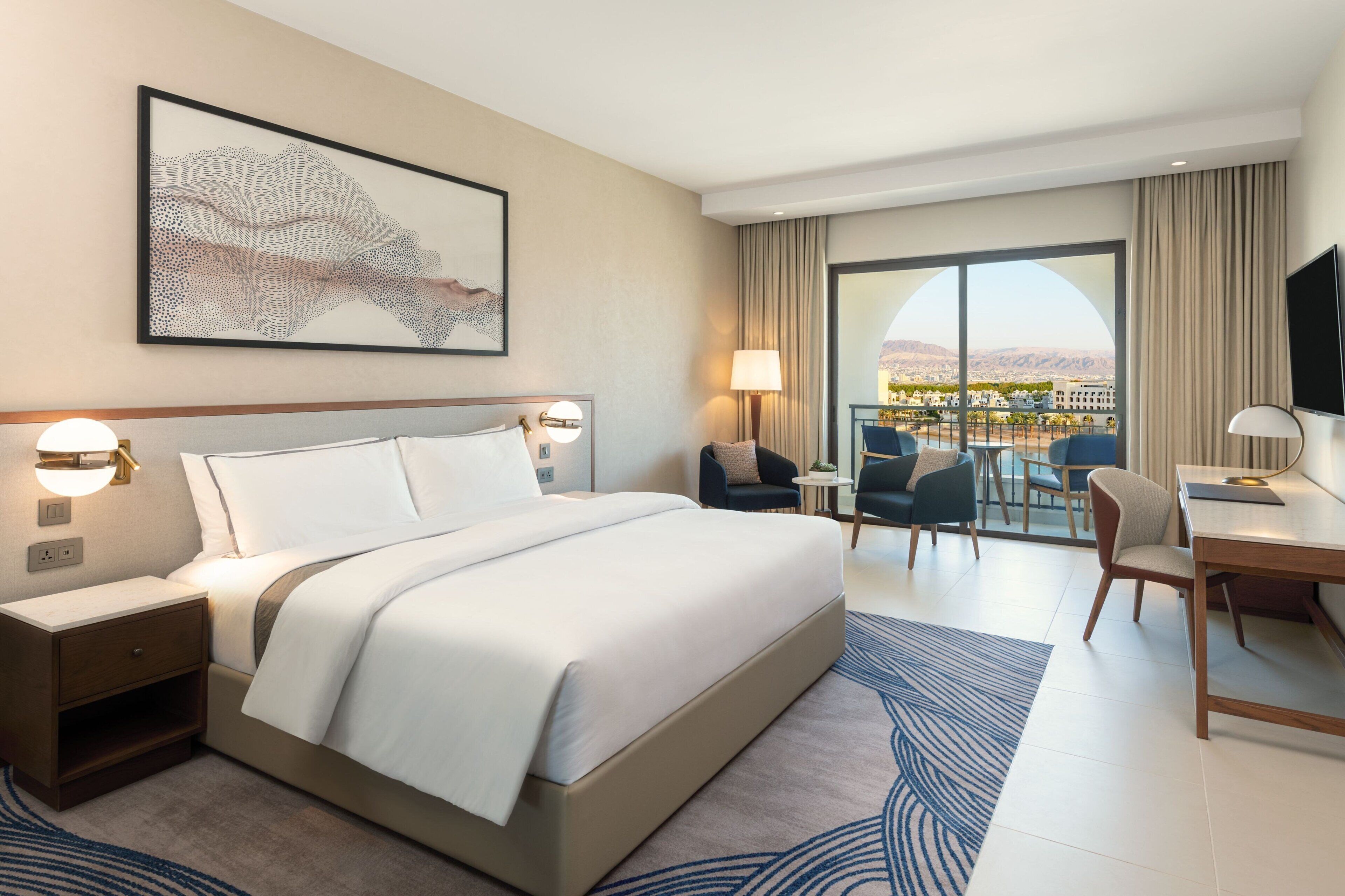 Suite, 1 King Bed, Balcony, Pool View | Minibar, in-room safe, desk, blackout drapes