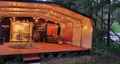 Fish, kayak or relax at a riverfront cabin in the woods of Rainier, Washington!