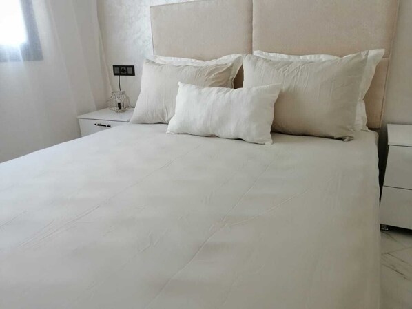 3 dormitorios, tabla de planchar con plancha, wifi y ropa de cama