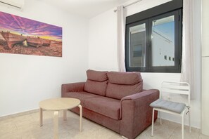 TV - Apartment 'Bellamar 4 Apartamento 2Dormitorios' with Wi-Fi and Air Conditioning (Barbate)