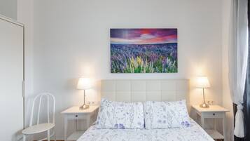 2 dormitorios, tabla de planchar con plancha, wifi gratis y ropa de cama