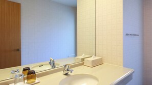 A bathroom with a sink, mirror, and toiletries. - Special JapaneseWestern small roompanoramic view of Mt Fuji  Lake Shoji / Minamitsurugun Yamanashi (Minamitsurugun)