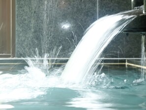A water feature with a clear stream flowing into a pool. - Special JapaneseWestern small roompanoramic view of Mt Fuji  Lake Shoji / Minamitsurugun Yamanashi (Minamitsurugun)