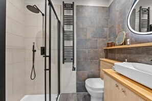 Shower, hair dryer, towels, soap