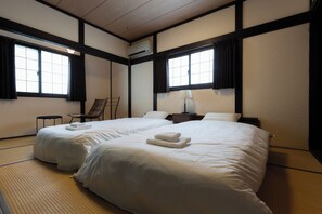 Desk, laptop workspace, free WiFi, bed sheets