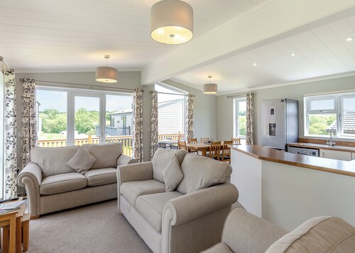 Escape to the Jasmine Lodge, nestled amidst stunning rolling countryside.