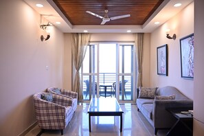 Premier 3BHK Room with Balcony & Valley view | Living area | 32-inch TV with satellite channels - Amritara Kasauli kollections (Kasauli)