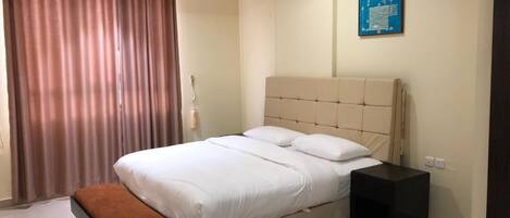 Apartamento ejecutivo | 2 dormitorios, tabla de planchar con plancha, wifi gratis