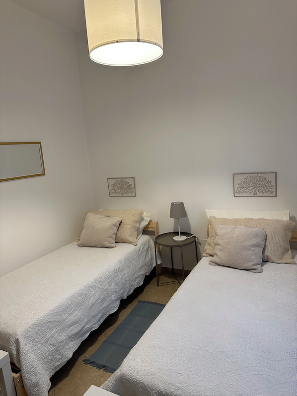 2 bedrooms, desk, iron/ironing board, travel crib