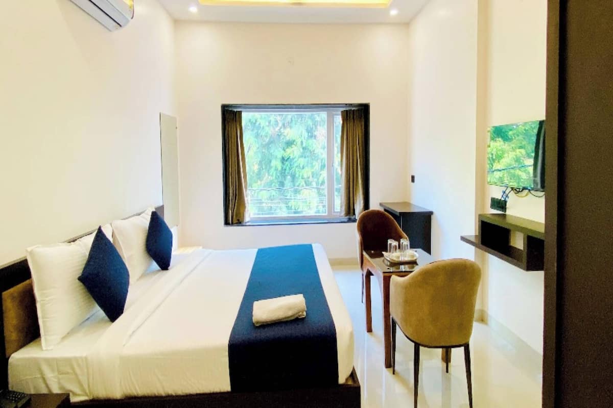 Premium kamer | Een bureau, gratis wifi, beddengoed