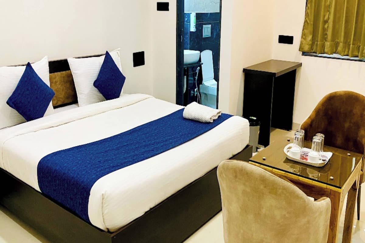 Deluxe kamer | Een bureau, gratis wifi, beddengoed