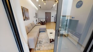Deluxe Apartment, 2 Bathrooms, City View | Living area | Smart TV - Luxury Apartment Metropolis NNP (Hanoi)