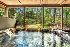 A hot tub with a view of a forest. - Bear Peak | Mountain Views, Hot Tub, Game Room, 1 Min to Camelback (Tannersville)
