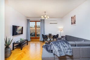 Apartament Deluxe, vistes a la ciutat | Sala d'estar