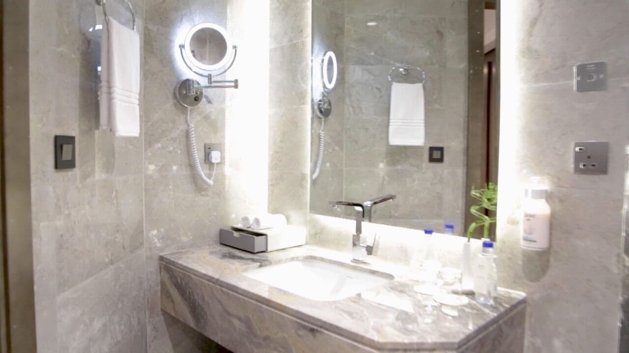 Shower, hair dryer, slippers, soap