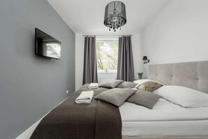 2 habitaciones, tabla de planchar con plancha, wifi y ropa de cama 