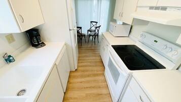 Microwave, stovetop, dishwasher, coffee/tea maker