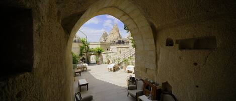 Comfort Triple Room, Courtyard View | Premium bedding, minibar, individually decorated, individually furnished