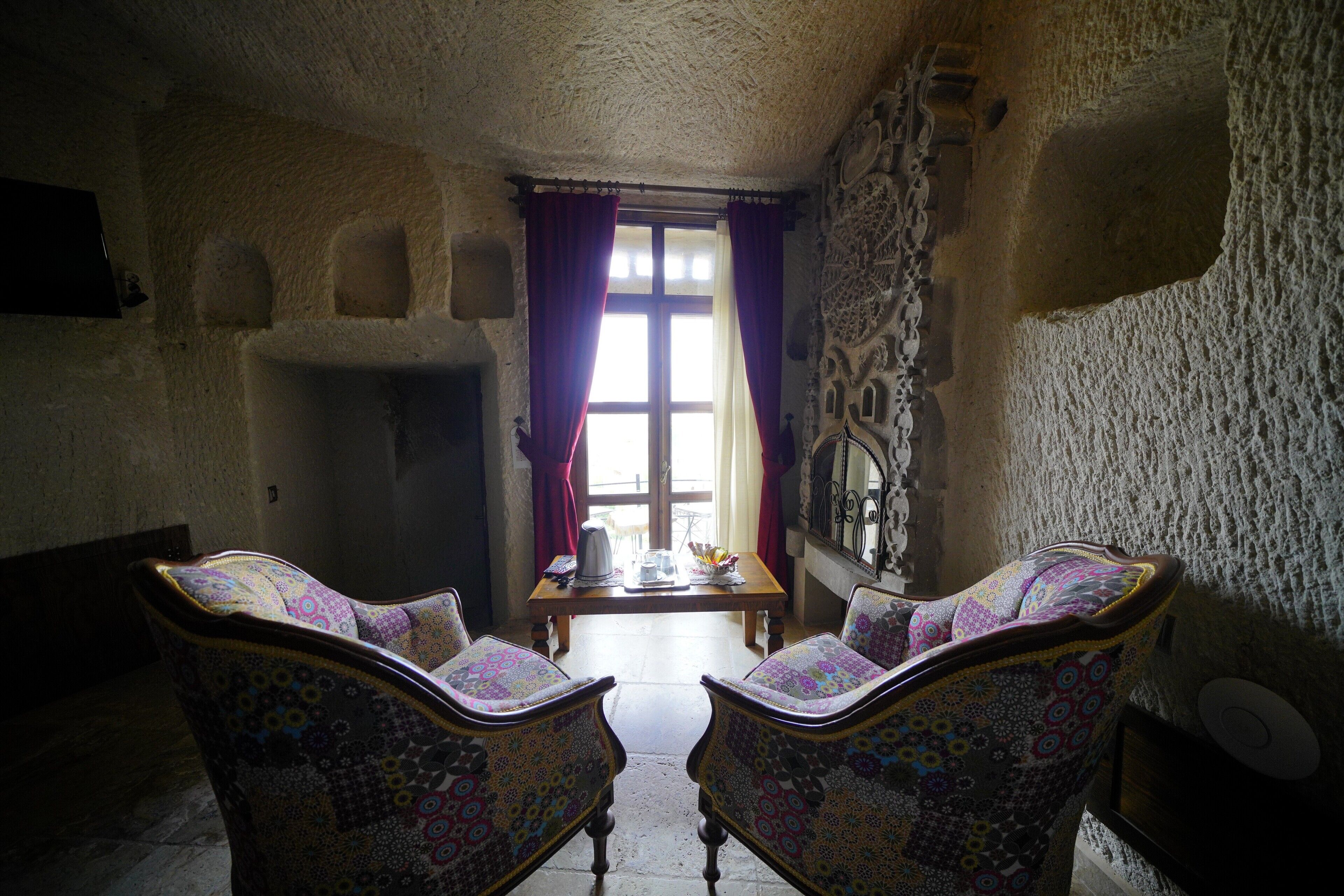 Deluxe suite, 1 kingsize bed, niet-roken, uitzicht op de stad | Luxe beddengoed, een minibar, individueel gedecoreerd