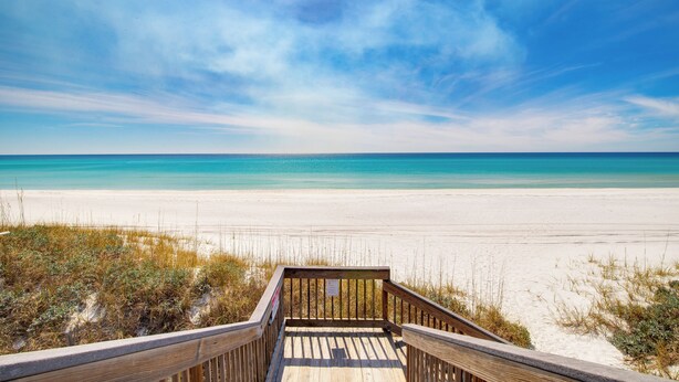 A wooden boardwalk leading to a beach with clear blue water and a sandy shore. - Magnolia by the Sea, Priv Beach, Pool (Santa Rosa Beach)
