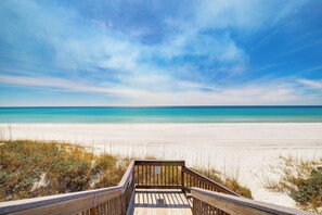 A wooden boardwalk leading to a beach with clear blue water and a sandy shore. - Magnolia by the Sea, Priv Beach, Pool (Santa Rosa Beach)