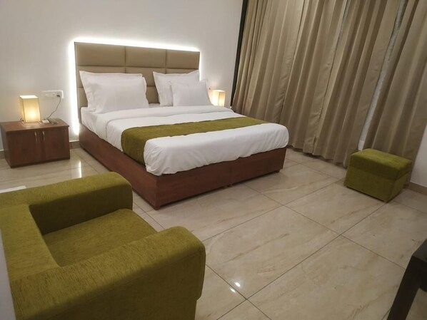 Deluxe Double or Twin Room, City View | Down comforters, pillowtop beds, minibar, desk - Hotels Vibes  (Vikasnagar)