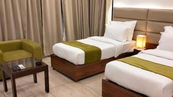 Down comforters, pillowtop beds, minibar, desk