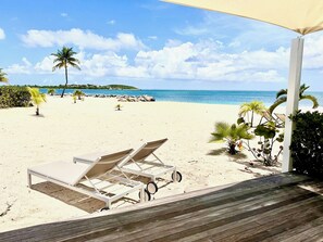 On the beach, sun-loungers, beach towels