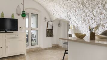 Apartment, Partial Sea View | Television