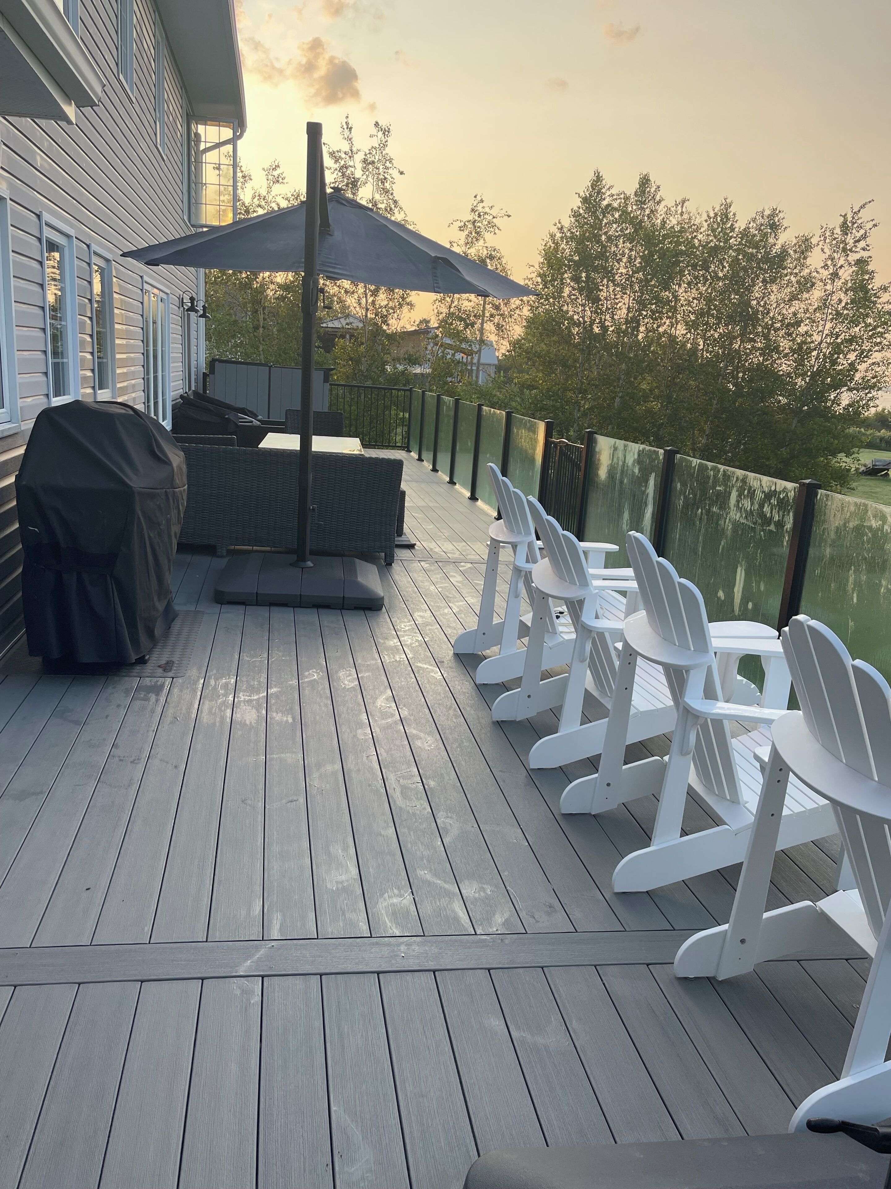 Deck L-shaped couch and table for outdoor dining